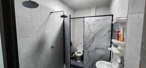 Basic Cabin, Mixed Dorm, Annex Building | Bathroom | Shower, rainfall showerhead, slippers, bidet - VT SKY SHIP HOTEL (Vientiane)