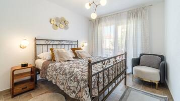 2 slaapkamers, een strijkplank/strijkijzer, gratis wifi, beddengoed