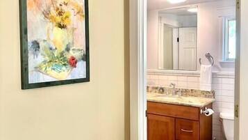 Bathtub, hair dryer, towels