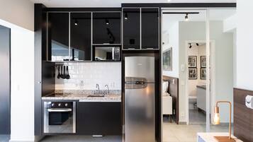 Apartamento | Cozinha privada | Produtos de limpeza