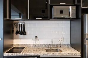 Apartamento | Cozinha privada | Produtos de limpeza