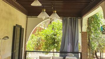 Panoramic House | Living area | 32-inch TV with premium TV channels, computer monitors, printers