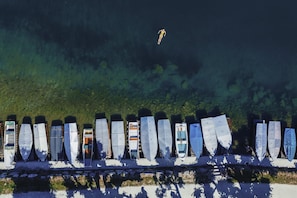 Boats line the waterfront, offering a serene scene.