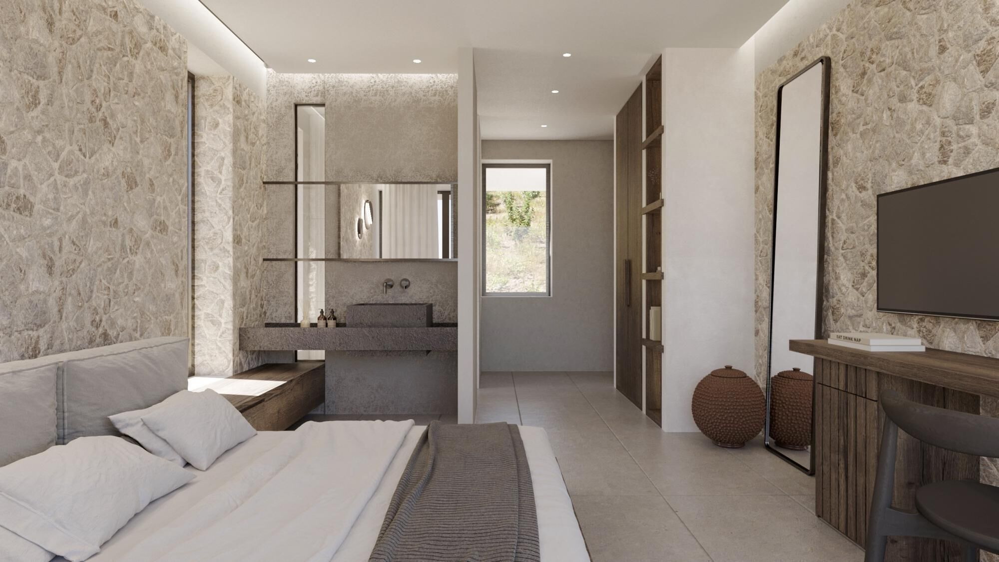 A modern bedroom with a large bed, a built-in vanity, and a TV mounted on the wall.