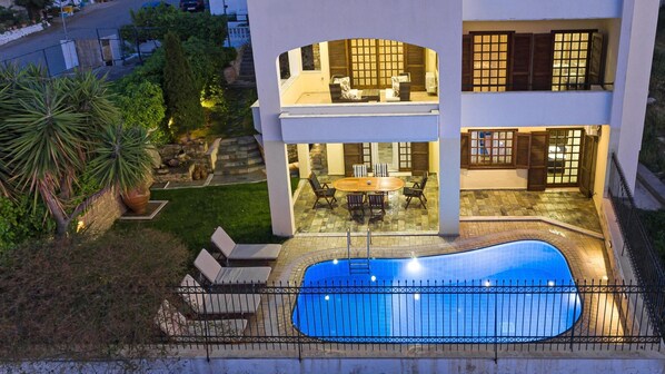 A two-story house with a swimming pool, outdoor seating, and a well-maintained garden. - Dim Art Villa - With Private Pool (Mylopotamos)