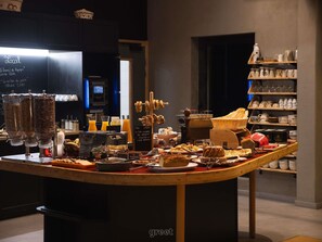 A breakfast buffet with various food items and a coffee station. - Greet Hotel Cernay Mulhouse (Cernay)