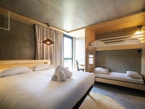 A room with a bunk bed, a single bed, and a desk. - Greet Hotel Cernay Mulhouse (Cernay)
