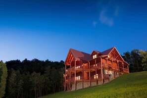 A large wooden cabin with multiple levels and balconies, surrounded by a forested landscape. - Private Mountain Escape for Large Groups Sleeps 17 (Dobson)