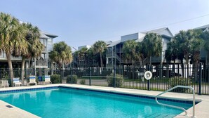 A swimming pool with lounge chairs and a no diving sign. - Fenimore Mill 2D - High Tide By the Gulf! (Cedar Key)