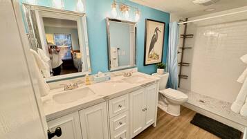 Shower, hair dryer, towels
