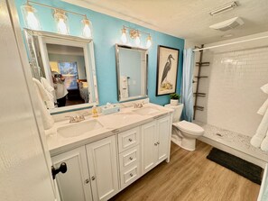Shower, hair dryer, towels