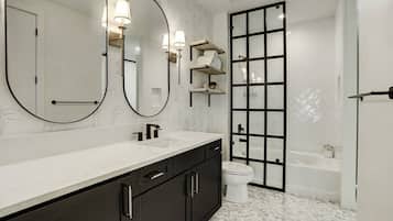 Bathtub, hair dryer, towels
