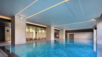 Indoor pool, open 6:00 AM to 11:00 PM, lifeguards on site