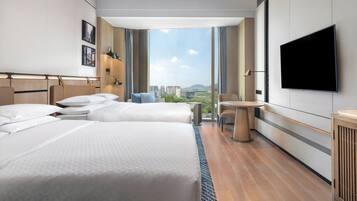Premium bedding, down comforters, in-room safe, desk