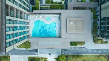Seasonal outdoor pool, open 6:00 AM to 11:00 PM, lifeguards on site