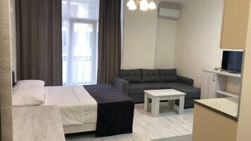 Suíte estúdio standard | Quartos à prova de som, Wi-Fi de cortesia, roupa de cama
