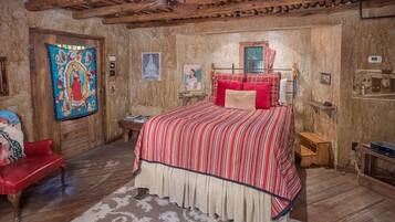 1 habitación, tabla de planchar con plancha y ropa de cama