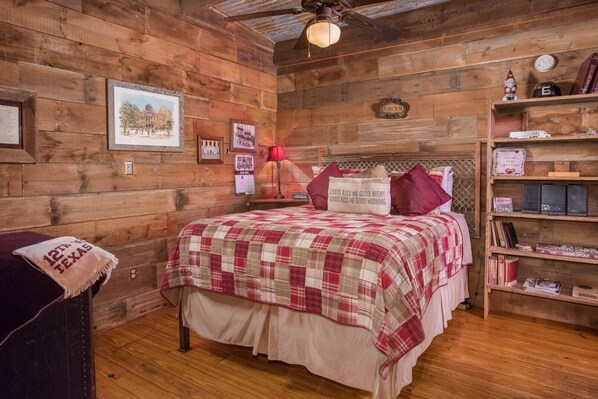 1 habitación, tabla de planchar con plancha y ropa de cama