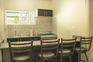 Fridge, blender, cookware/dishes/utensils