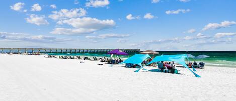 On the beach, sun-loungers, beach towels