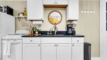 Coffee/tea maker, fridge, microwave, oven