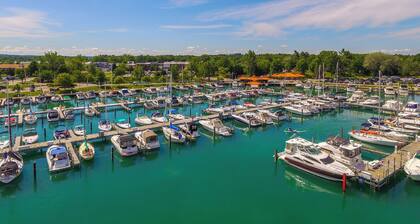 Elk Rapids Condo w/ Balcony Overlooking Elk Lake!