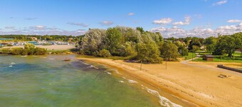 Elk Rapids Condo w/ Balcony Overlooking Elk Lake!
