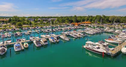 Elk Rapids Condo w/ Balcony Overlooking Elk Lake!