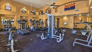A gym with treadmills, elliptical machines, and weight stations. - Dog-friendly Condo w/ Pool & Hot Tub in Phoenix (Phoenix)