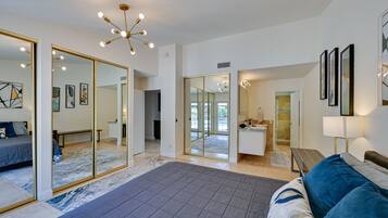 4 bedrooms, laptop workspace, iron/ironing board, bed sheets