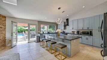 House (4 Bedrooms) | Private kitchen | Microwave, oven, stovetop, dishwasher