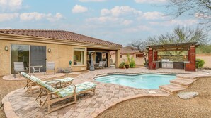 A backyard with a swimming pool, outdoor seating, and a barbecue area. - Luxe Couples Retreat w/ Pool & Outdoor Kitchen! (Phoenix)