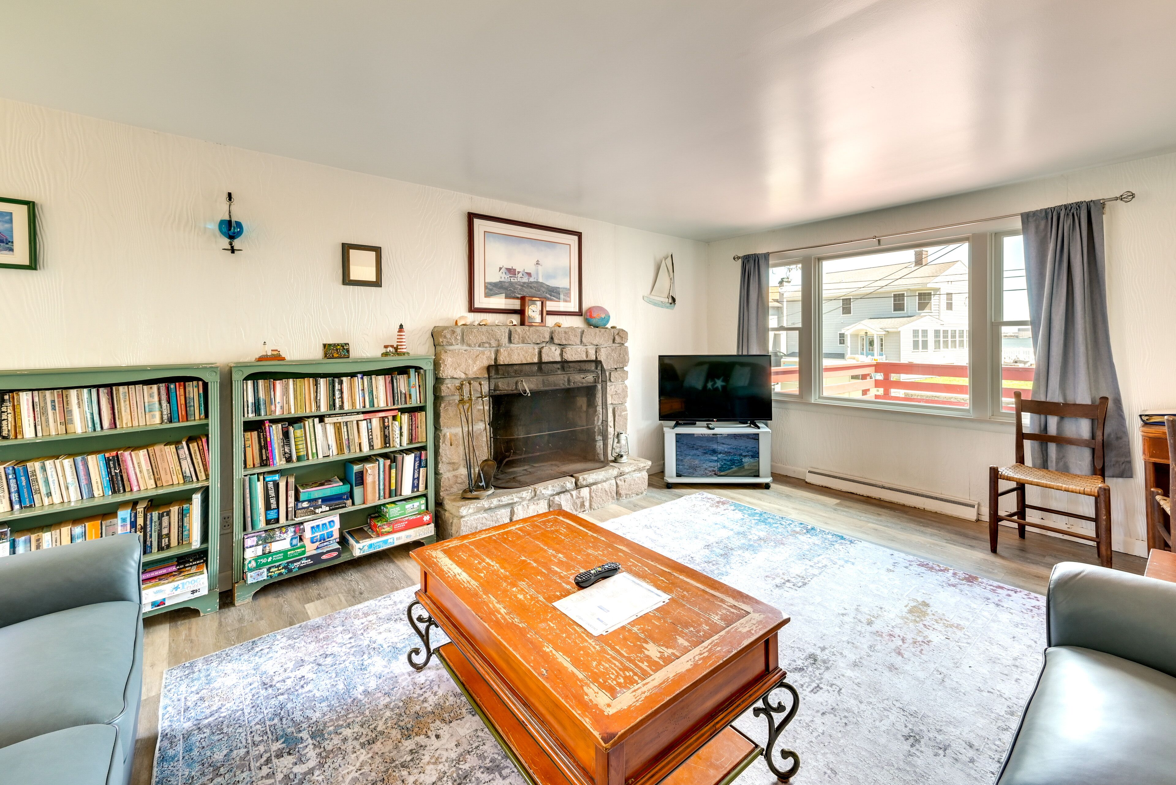 TV, fireplace, books