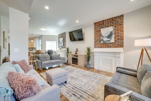 TV, fireplace, books