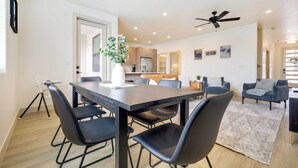 A modern kitchen with wooden cabinets, a built-in oven, and a refrigerator. - Modern Santa Clara Vacation Rental w/ Patio (Santa Clara)