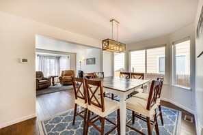 Enjoy meals in this dining area with a large table and six comfortable chairs.