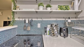 A kitchen with white shelves, potted plants, a coffee machine, and a kettle. - 2 Mi to Asu: Studio w/ Private Hot Tub in Tempe (Tempe)