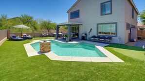 A two-story house with a swimming pool, outdoor seating, and a covered patio area. - 1/2 Mi to Lake: Family Home w/ Hot Tub in Goodyear (Goodyear)