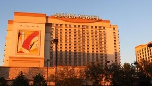 A hotel named Golden Nugget with a large sign on the building. - Cozy Lake Charles Studio w/ Golf Course Views (Lake Charles)