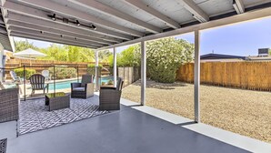A covered patio area with outdoor furniture, a pool, and a view of the backyard. - 3 Mi to Asu! Snowbird Poolside Escape in Tempe (Tempe)
