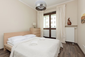 Apartment, 1 Bedroom, Balcony | 1 bedroom, bed sheets