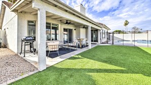 A house with a covered patio, outdoor seating, a grill, and a swimming pool. - Pool, BBQ & Patio: Gilbert Getaway Near Golfing (Gilbert)