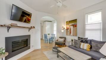 TV, fireplace, books