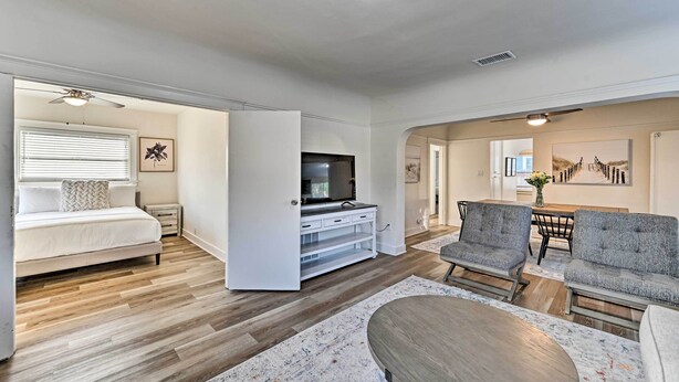 A spacious living room with a sofa set, a TV, and a dining area. - Walk to Poway Farmers' Market: Family Retreat! (Poway)