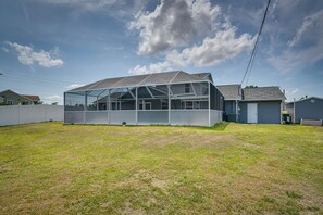 House (3 Bedrooms) | Interior - Screened-in Lanai + Yard: Port Charlotte Retreat (Port Charlotte)