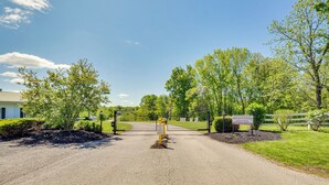 A gated entrance with a sign indicating no parking beyond the gate. - Taylorsville Lake Cottage Rental w/ Hot Tub! (Taylorsville)