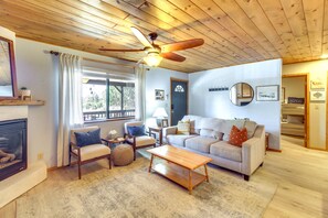 House (2 Bedrooms) | Living area | Fireplace, books