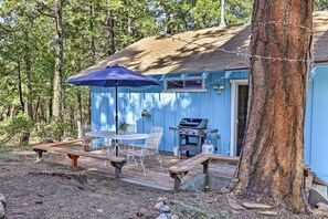 Outdoor dining - Peaceful Camp Connell Cabin w/ Community Pool (Arnold)