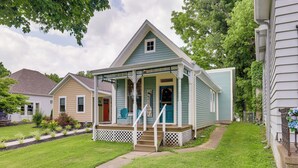 A single-story house with a porch, a front door, and a small staircase leading to the entrance. - Historic Madison Retreat - 1 Mi to Ohio River (Madison)