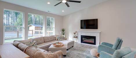 House (4 Bedrooms) | Living area | TV, fireplace